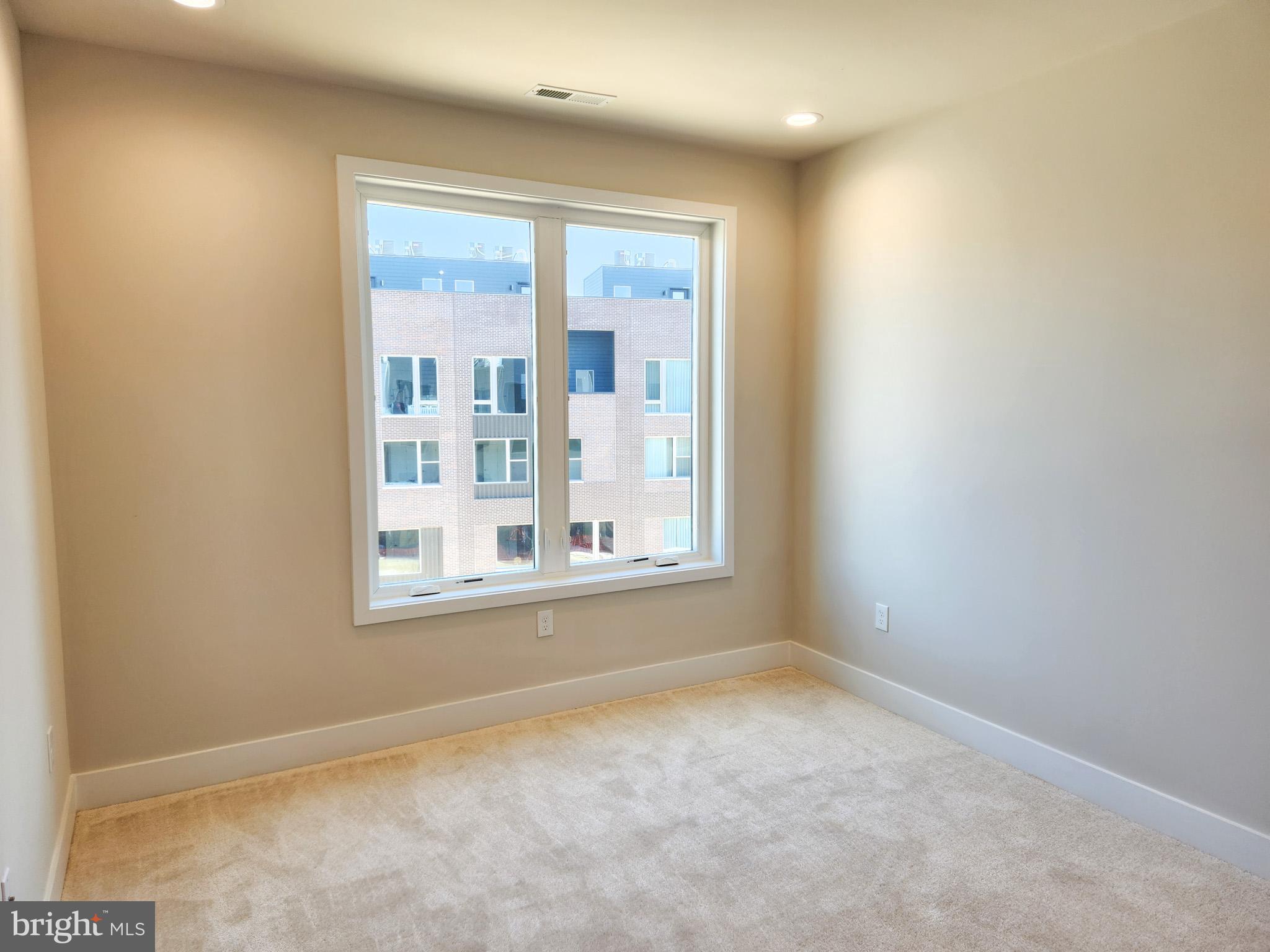 3150 Parkview Walk, Unit 213 Philadelphia, PA 19125 - Photo 13 of 21 an empty room with a window