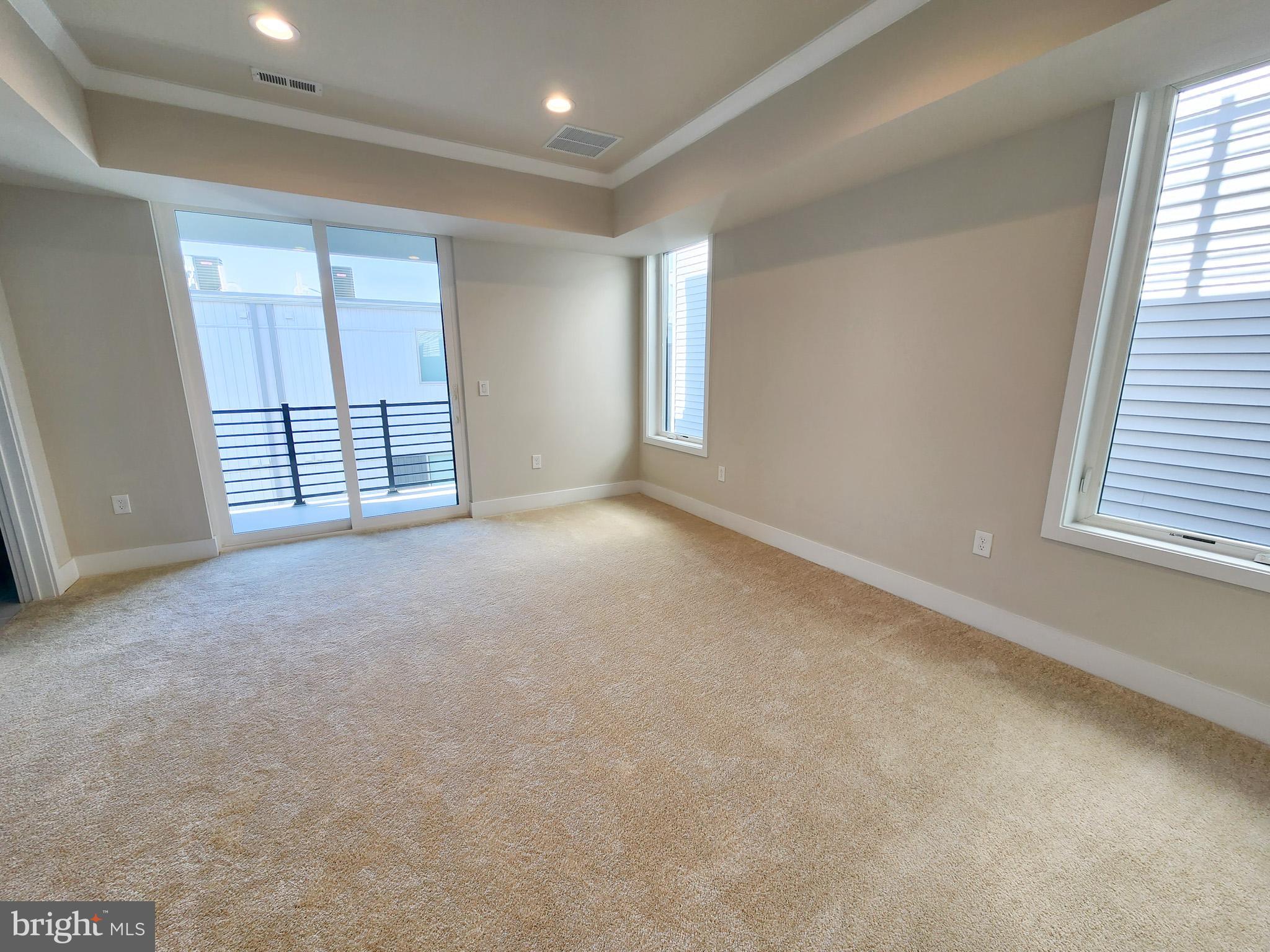 3150 Parkview Walk, Unit 213 Philadelphia, PA 19125 - Photo 8 of 21 an empty room with windows