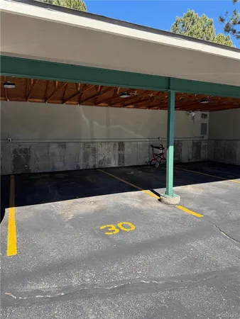a view of a balcony with trees