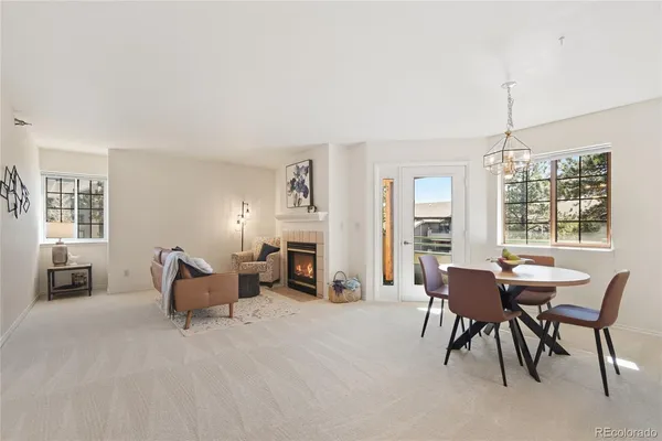 a view of a livingroom with furniture and windows
