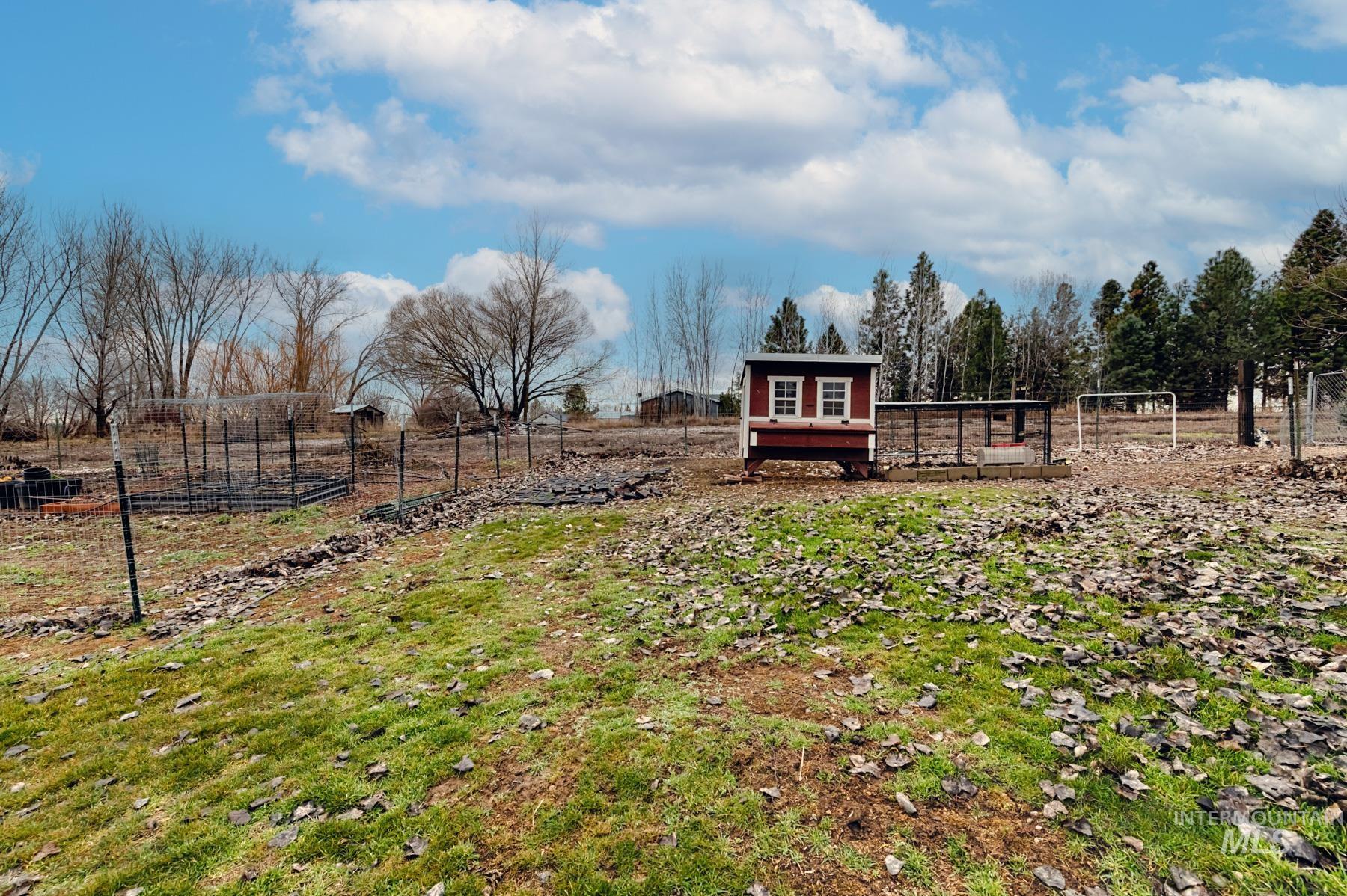 7500 Pleasant View Drive Caldwell, ID 83607 - Photo 19 of 43 View of yard featuring an outbuilding and exterior structure