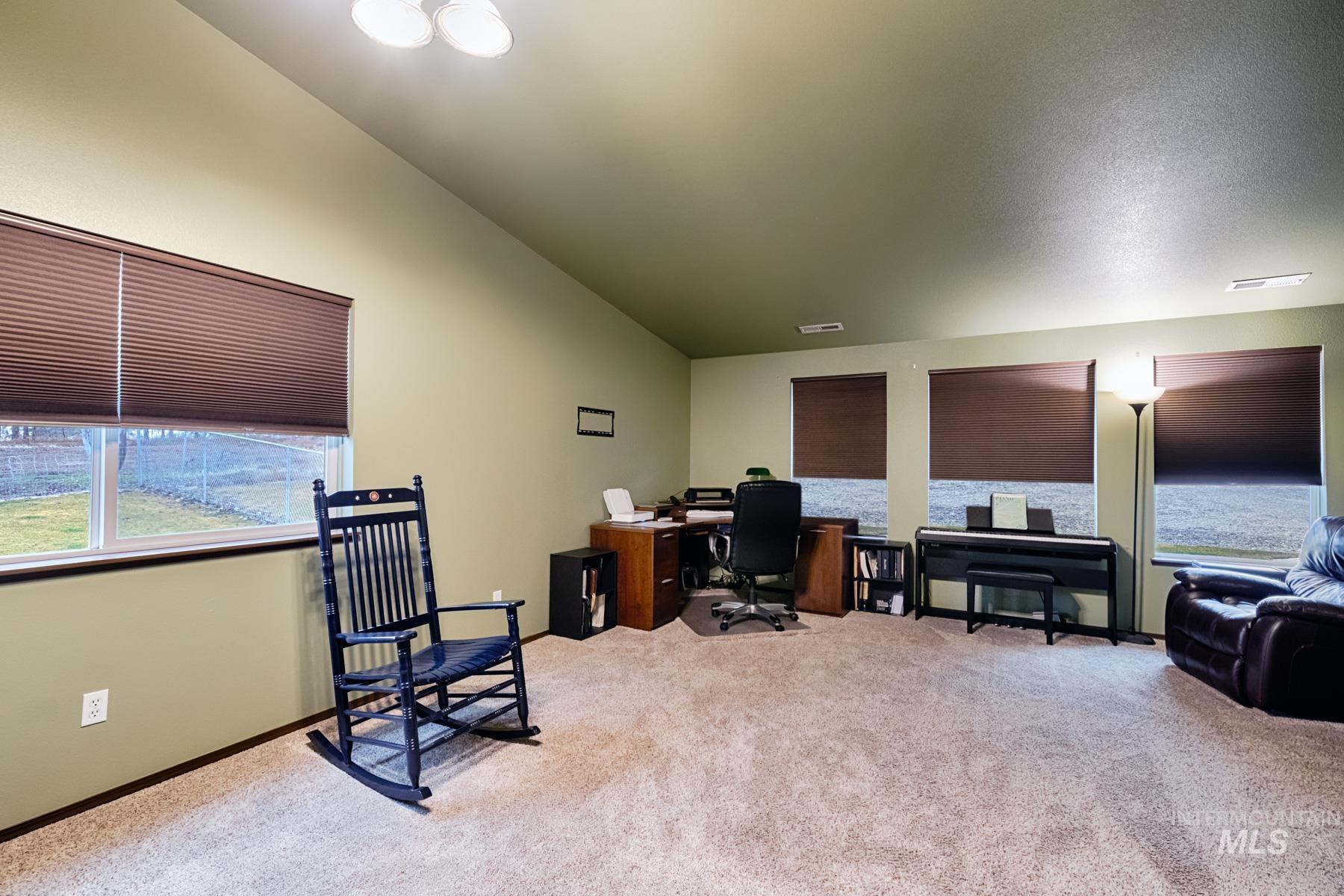 7500 Pleasant View Drive Caldwell, ID 83607 - Photo 4 of 43 Office space with light carpet and vaulted ceiling