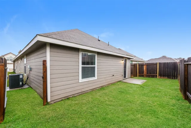 a view of a backyard with a garden