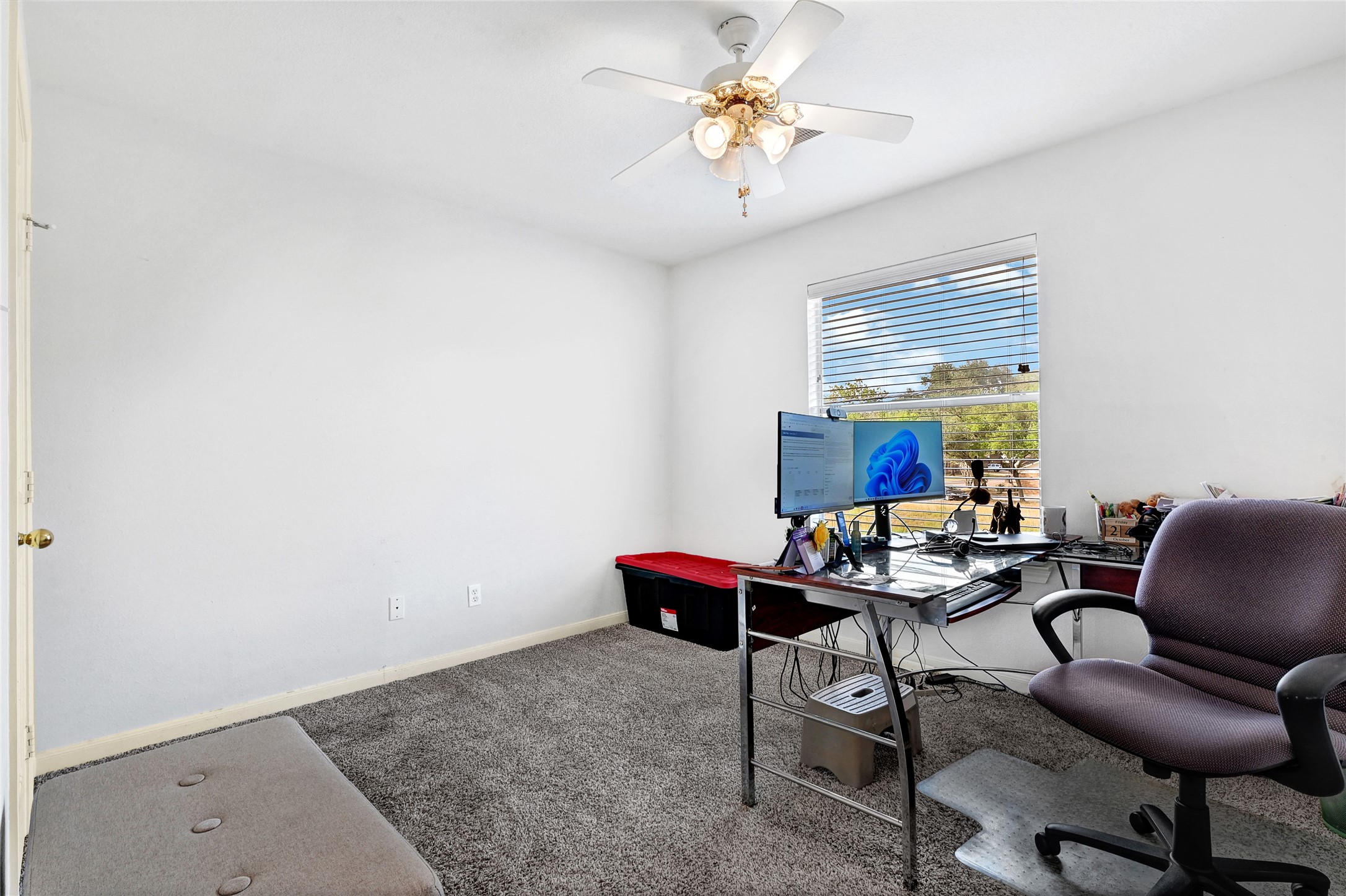 10100 Spring Pl Drive Houston, TX 77070 - Photo 21 of 24 Versatile bedroom perfect for a home office, guest room, or additional living space.