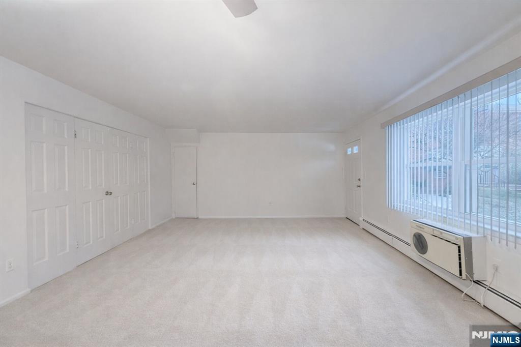 55 Knox Terrace, Unit 1A Wayne, NJ 07470 - Photo 2 of 9 a view of a room with window