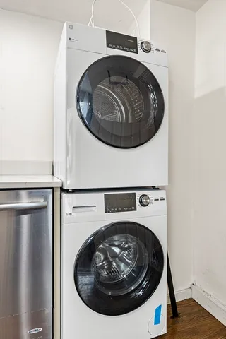 a utility room with washing machine