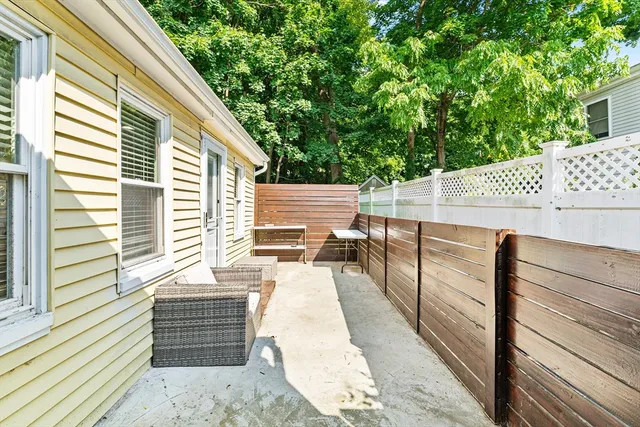 a balcony with view of outdoor space