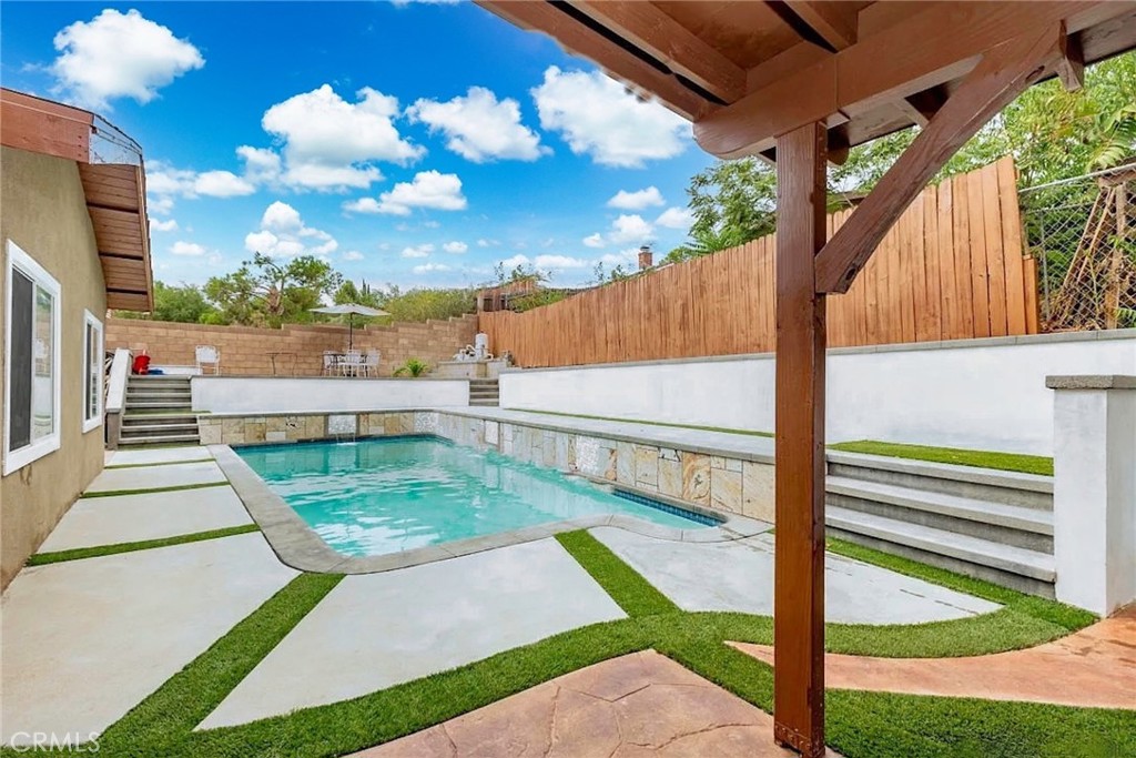 38603 Sage Tree Street Palmdale, CA 93551 - Photo 13 of 17 a view of a backyard with sitting area
