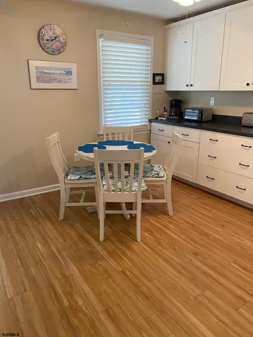 a table and chairs in a kitchen