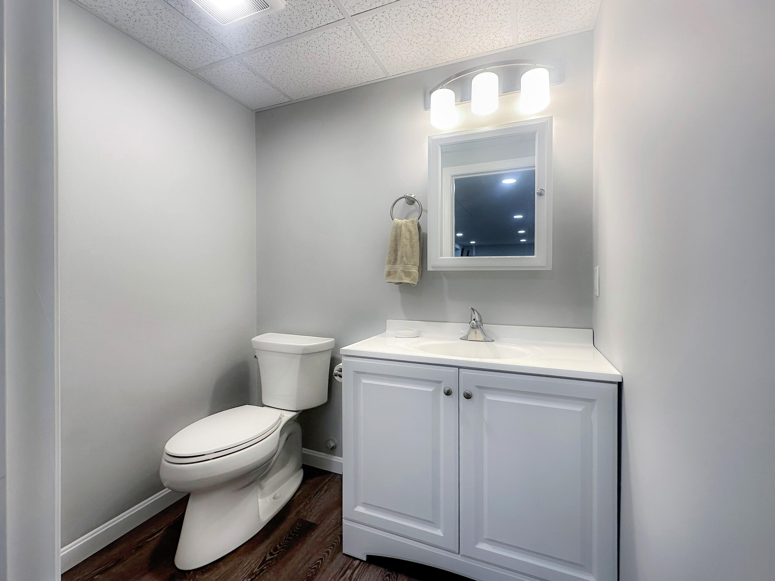 5 Baker Road Wellfleet, MA 02667 - Photo 30 of 30 a bathroom with a toilet sink and mirror