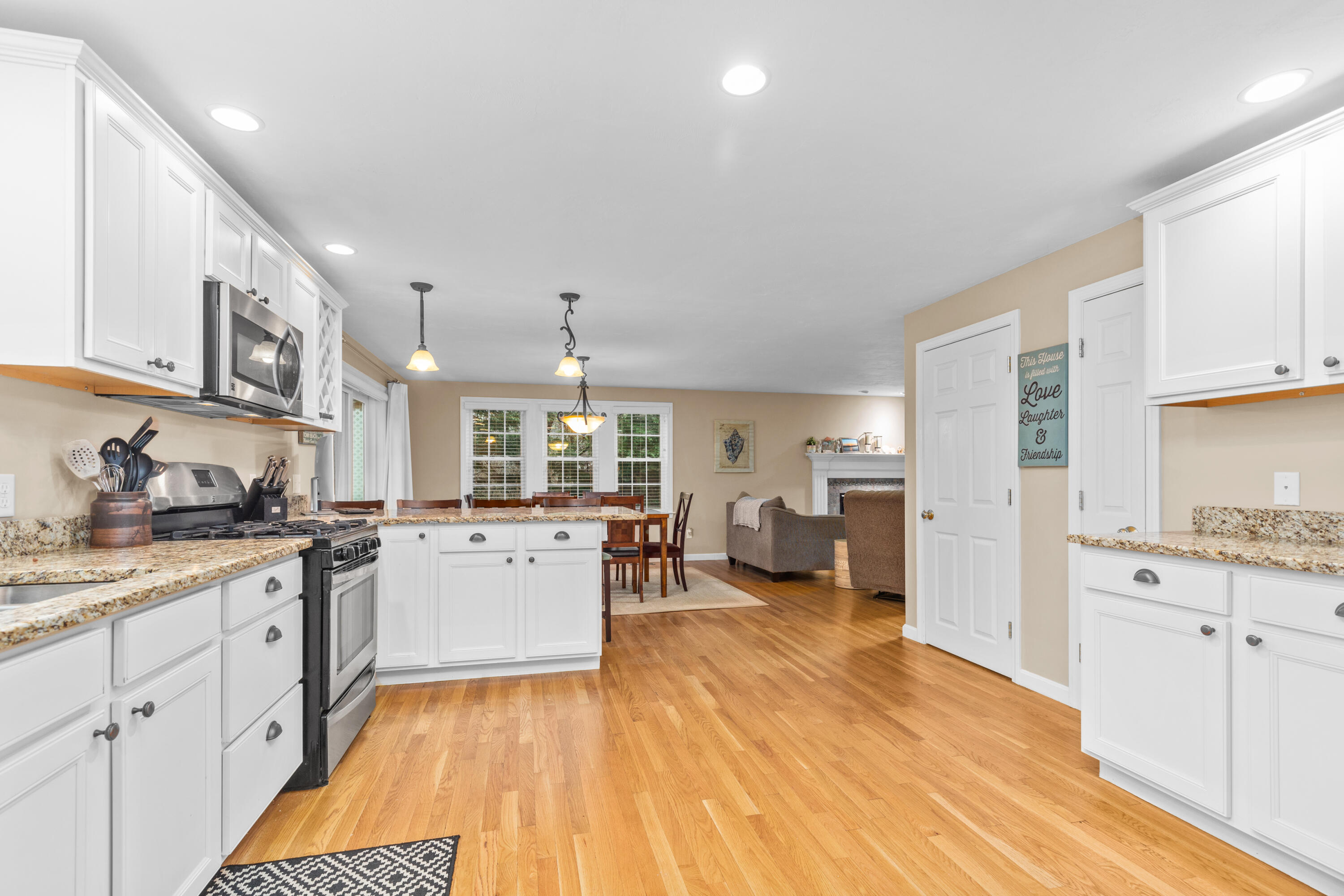 5 Baker Road Wellfleet, MA 02667 - Photo 5 of 30 a large kitchen with a lot of counter space and wooden floor