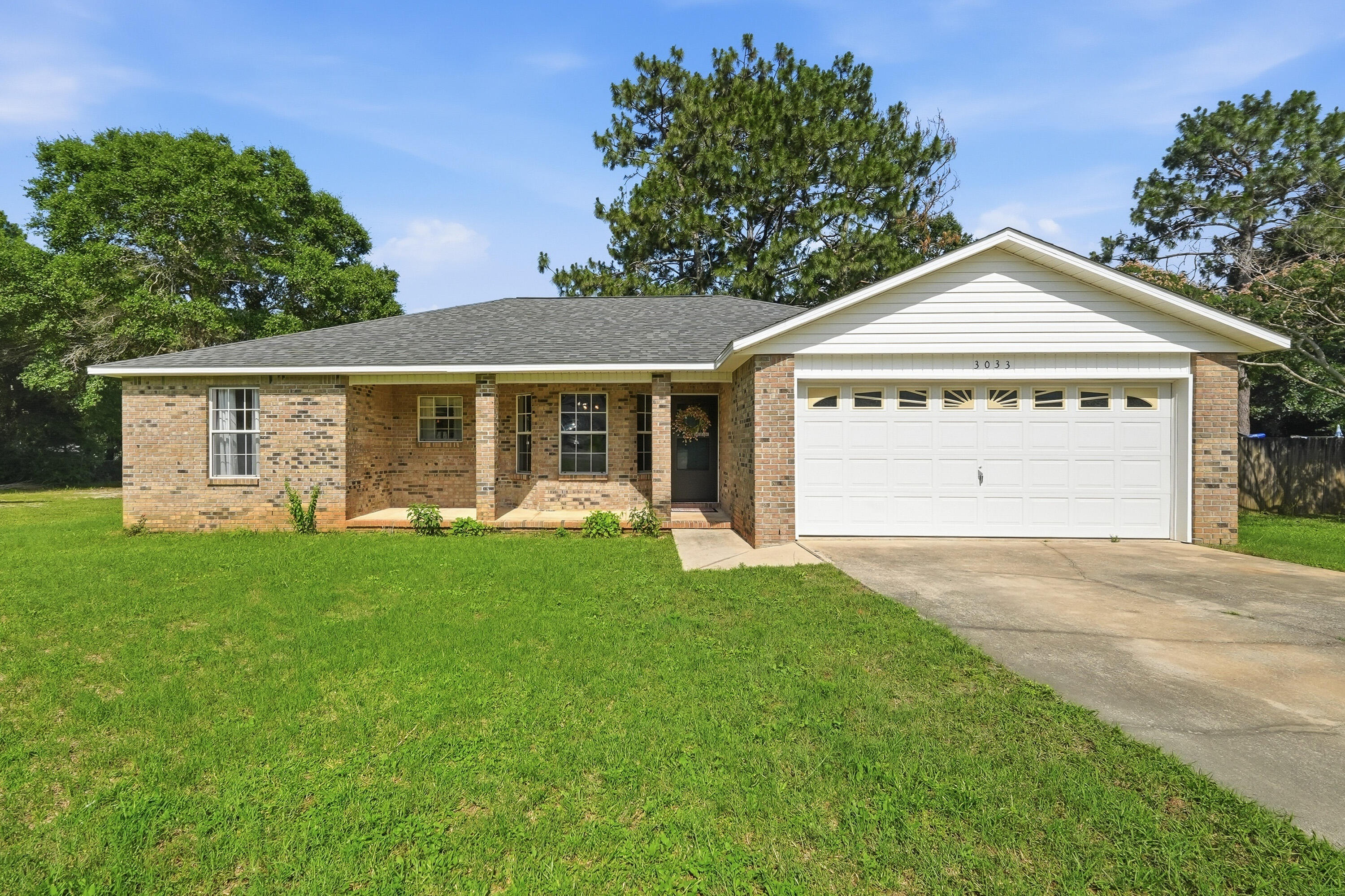 3033 Cabela Lane Crestview, FL 32539 - Photo 1 of 32 a view of a house with a yard
