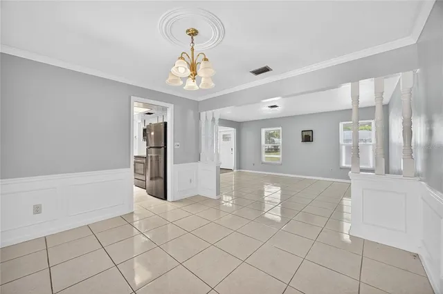 a view of an empty room and window