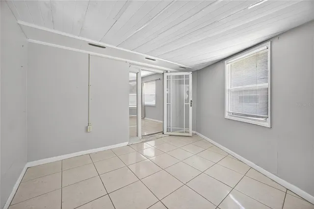 a bathroom with double sink and a toilet