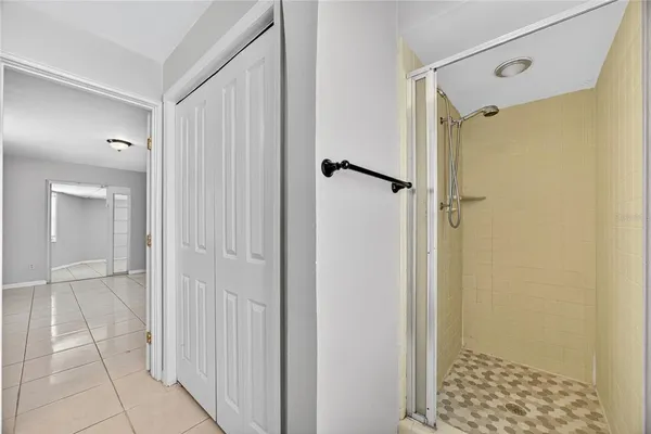 a view of an empty room and a window