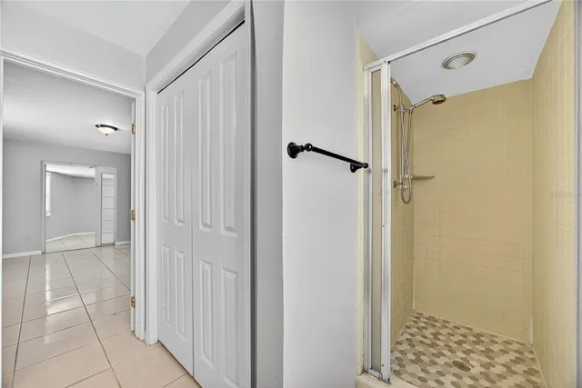 a view of an empty room and a window