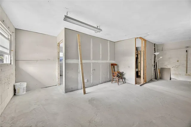 a bathroom with a tub and shower