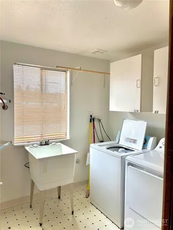 a workspace with furniture and window