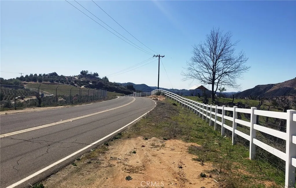 44 El Calamar Road Temecula, CA 92590 - Photo 15 of 15 a view of a yard with wooden fence