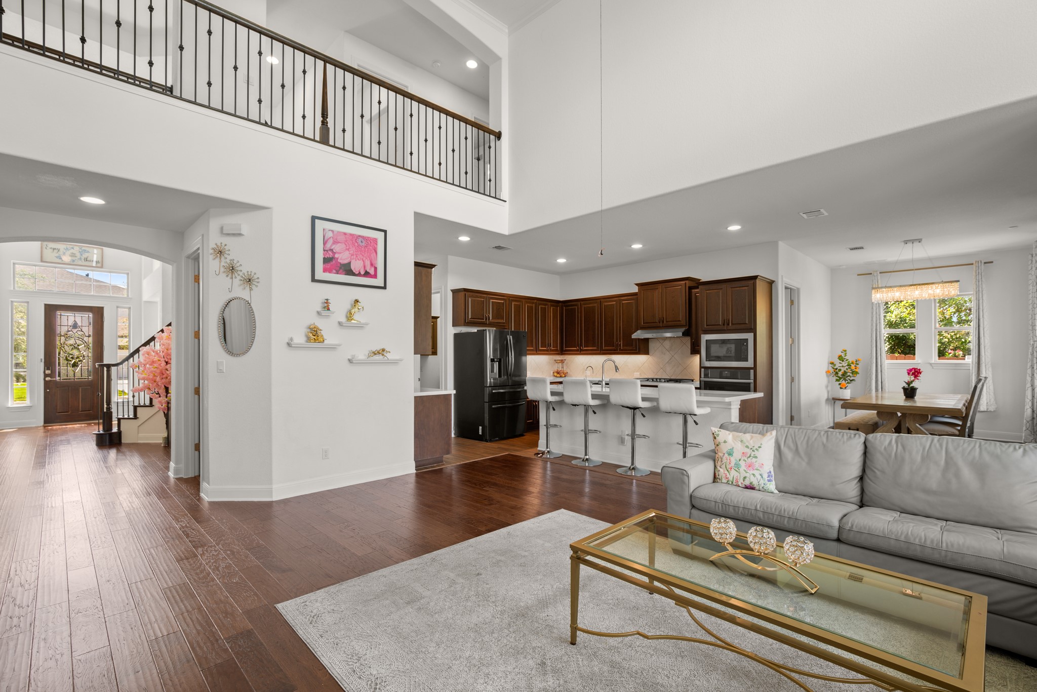 2817 Gatlin Cove Leander, TX 78641 - Photo 40 of 40 The heart of the home is the great room open floor plan with soaring two story ceiling towering over the living area that open to the hallway above for seamless connectivity.