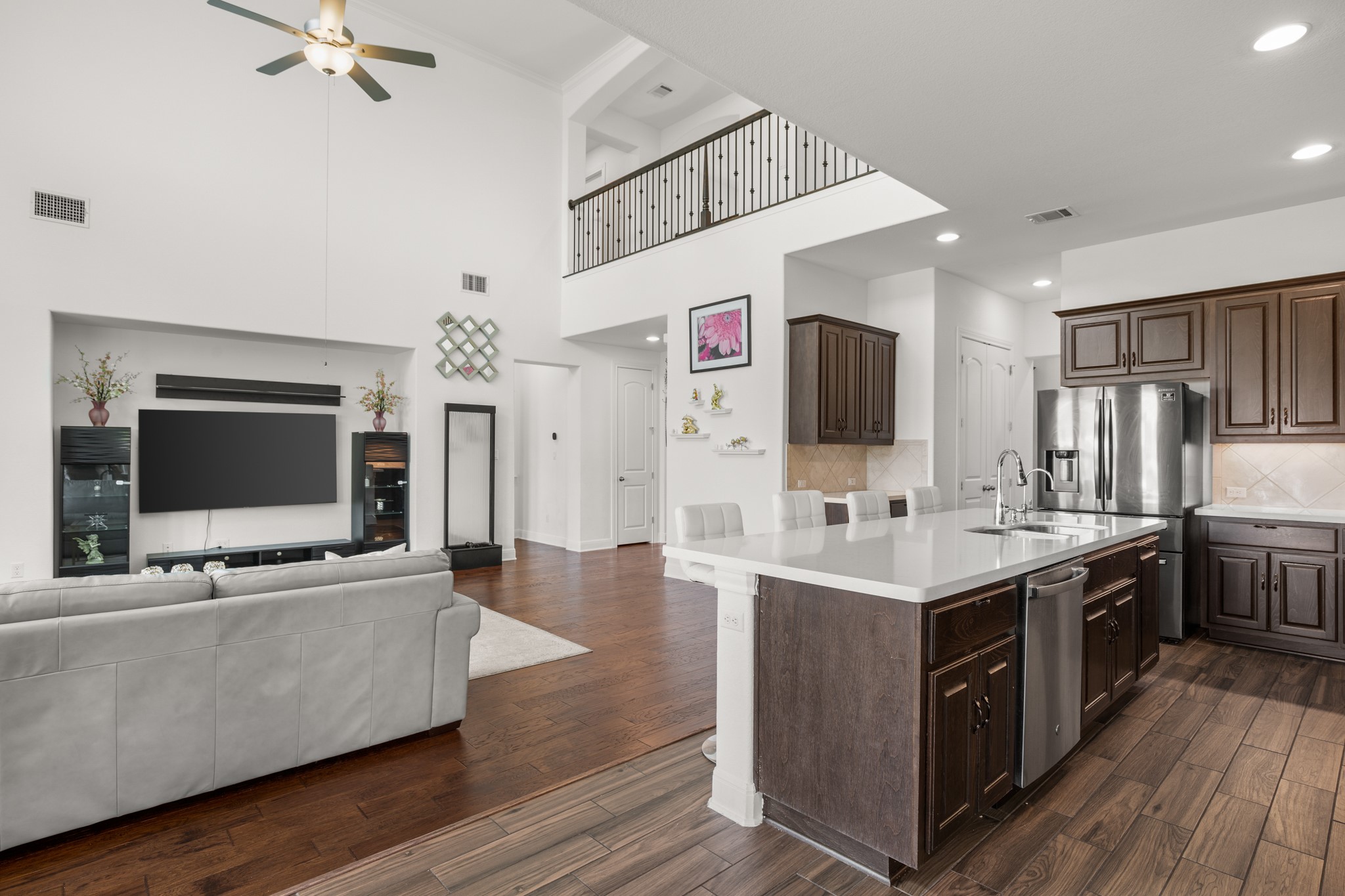 2817 Gatlin Cove Leander, TX 78641 - Photo 13 of 40 A cafe counter and pantry storage add convenience, along with the direct access to the formal dining room and the kitchen dining area for easy serving.