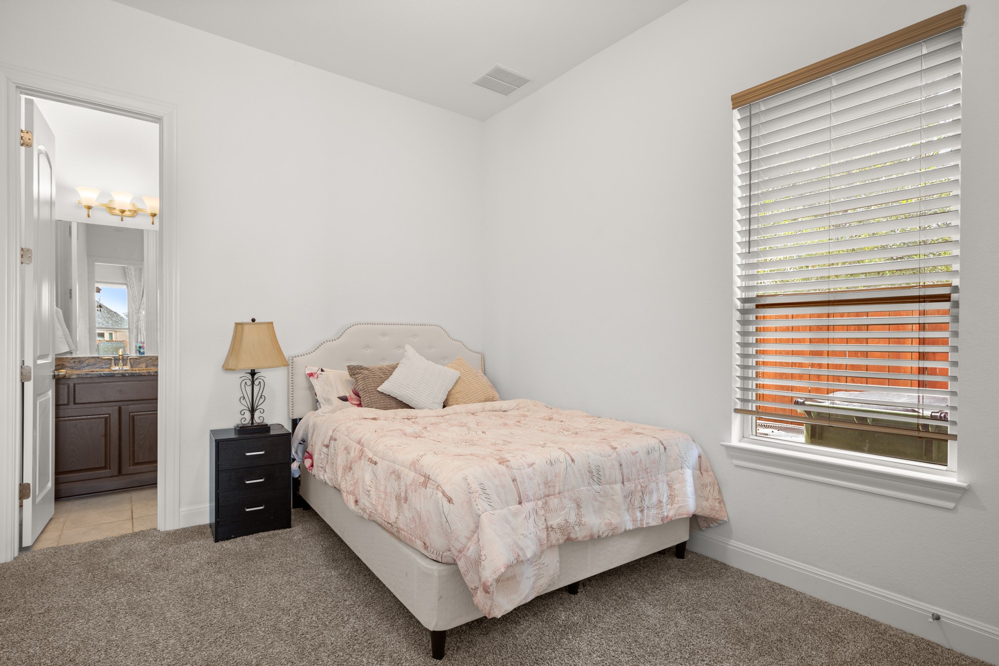 2817 Gatlin Cove Leander, TX 78641 - Photo 23 of 40 The main floor also offer a convenient guest suite complete with its own ensuite bath.