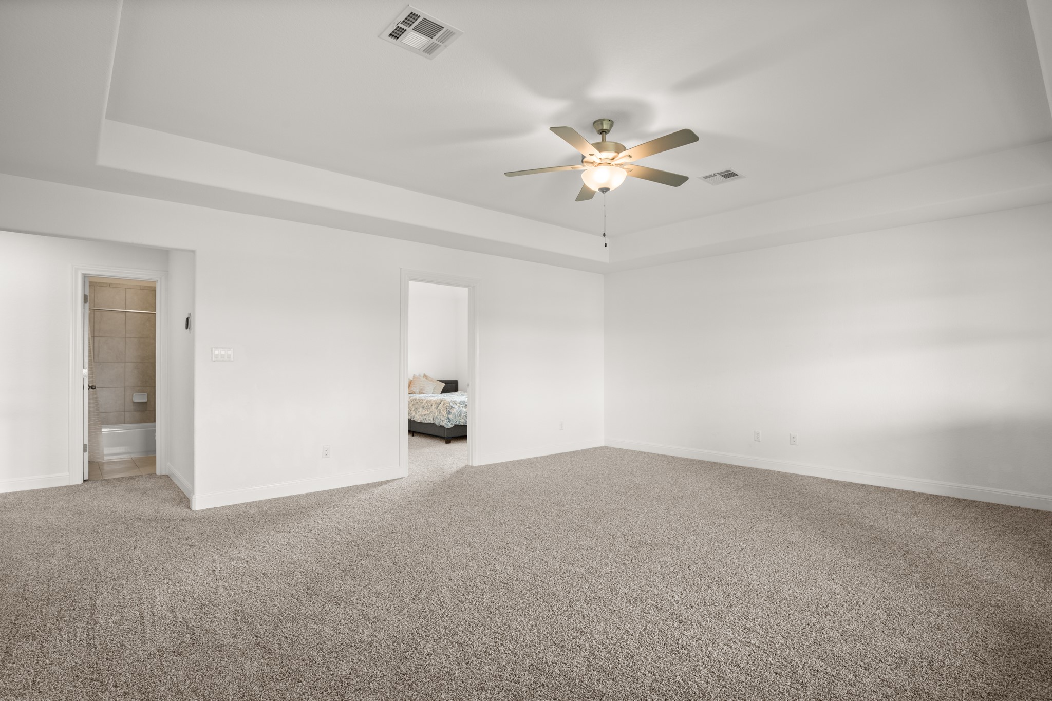 2817 Gatlin Cove Leander, TX 78641 - Photo 26 of 40 The game room provides that desirable bonus living area space that allows you to have space for everyone and their activities.