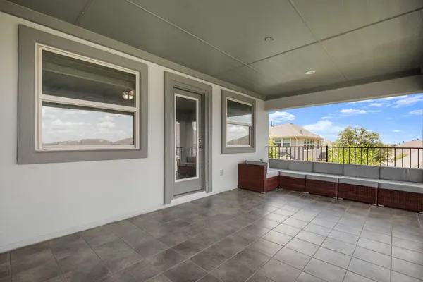 a view of a hallway with windows