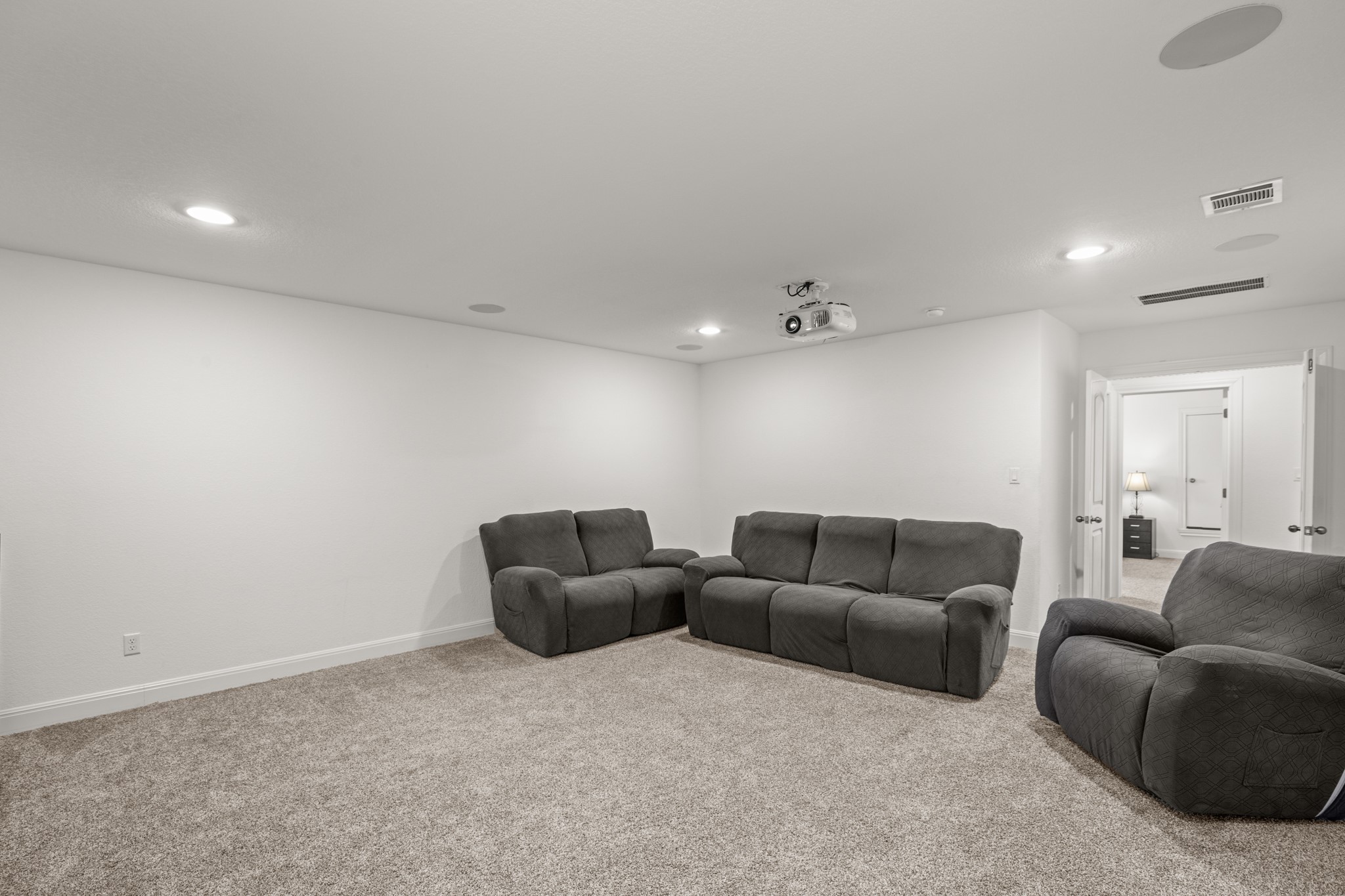 2817 Gatlin Cove Leander, TX 78641 - Photo 29 of 40 The media room features built-in 7-in-1 surround sound system.