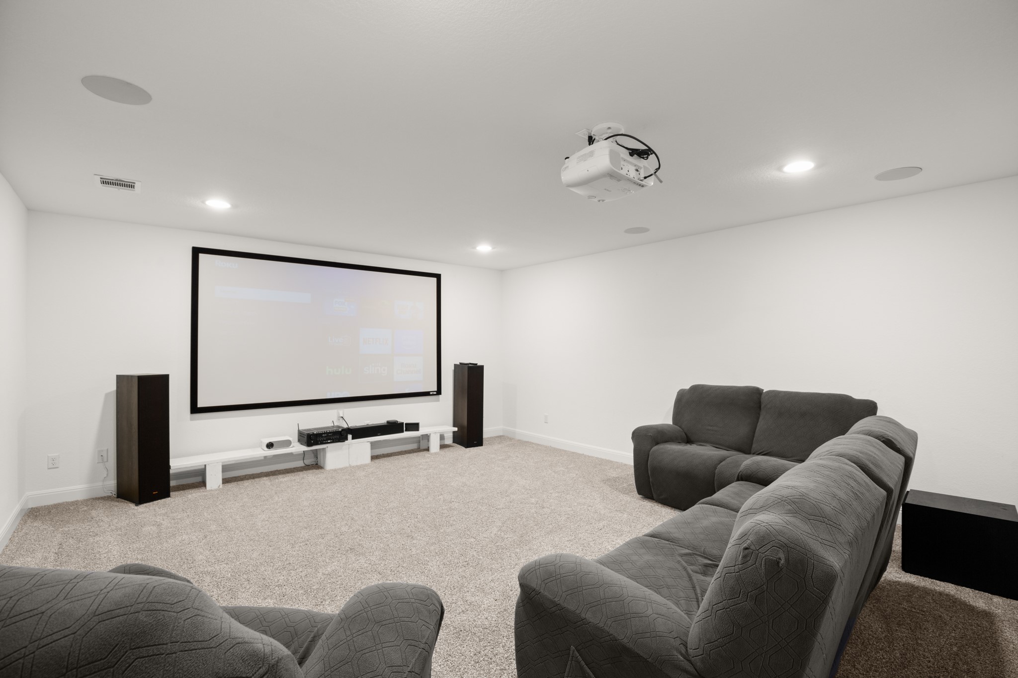 2817 Gatlin Cove Leander, TX 78641 - Photo 3 of 40 Take your movie nights to the next level with this awesome media room, which comes complete with a built-in 7-in-1 surround sound system.