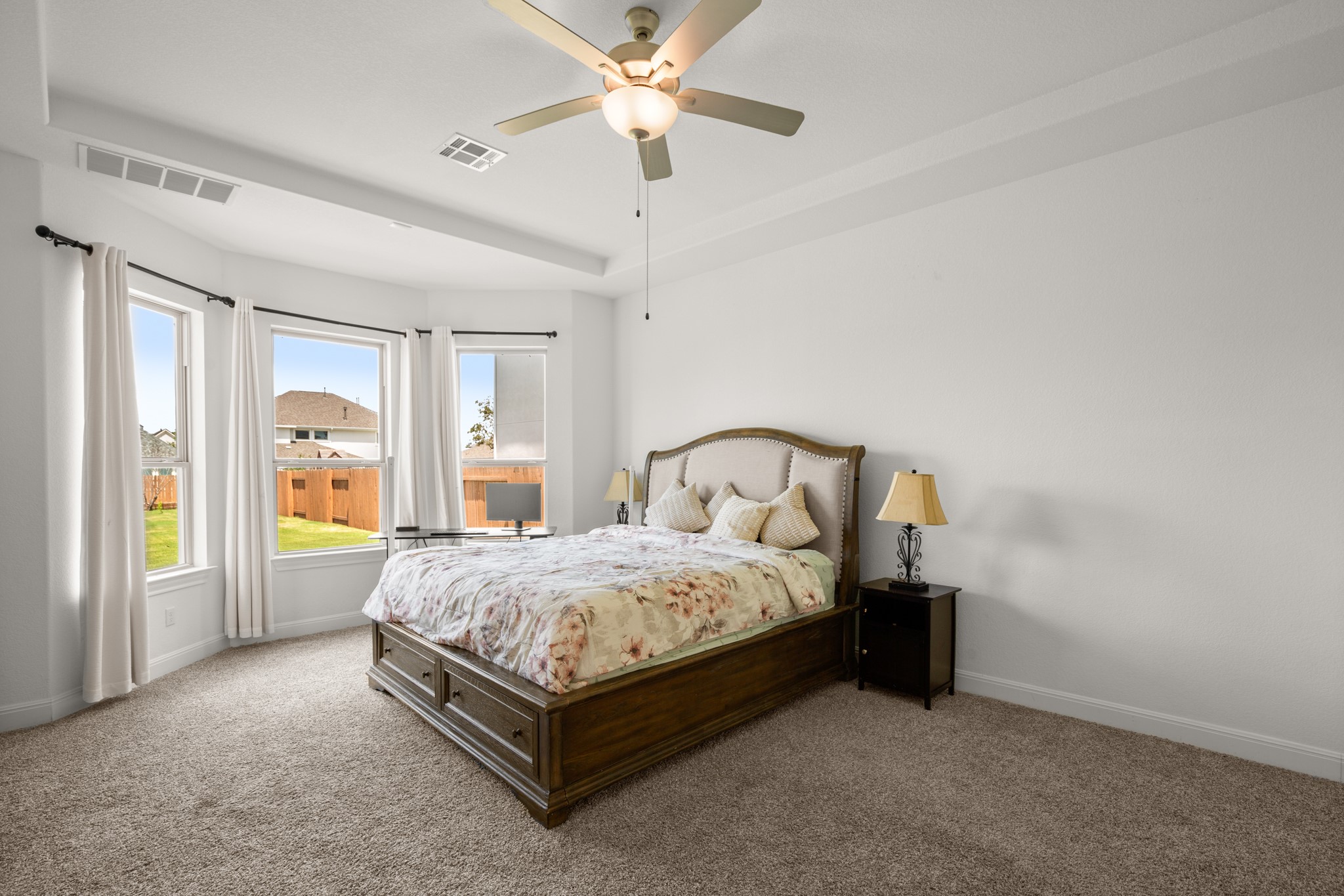 2817 Gatlin Cove Leander, TX 78641 - Photo 4 of 40 This home offers 5 dedicated bedrooms, plus a home office, with a guest suite and this luminous primary suite tucked away on the main floor.