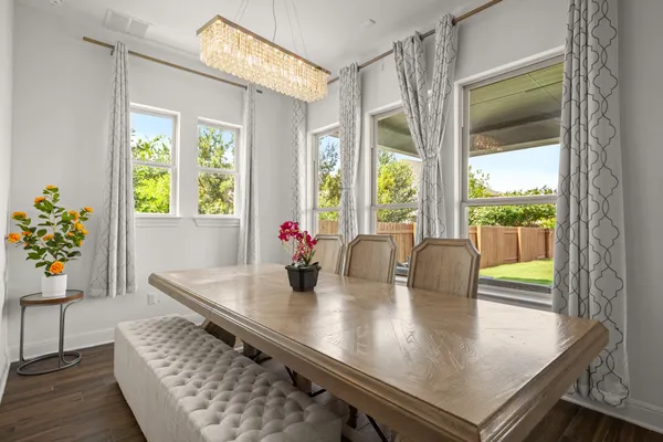 a bedroom with a bed window and a ceiling fan