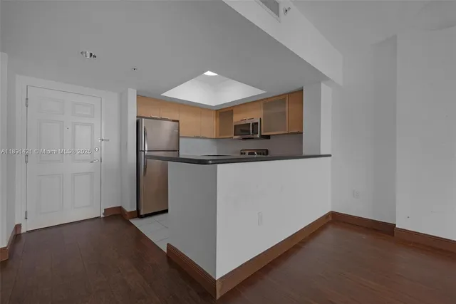 a view of a hallway with entryway