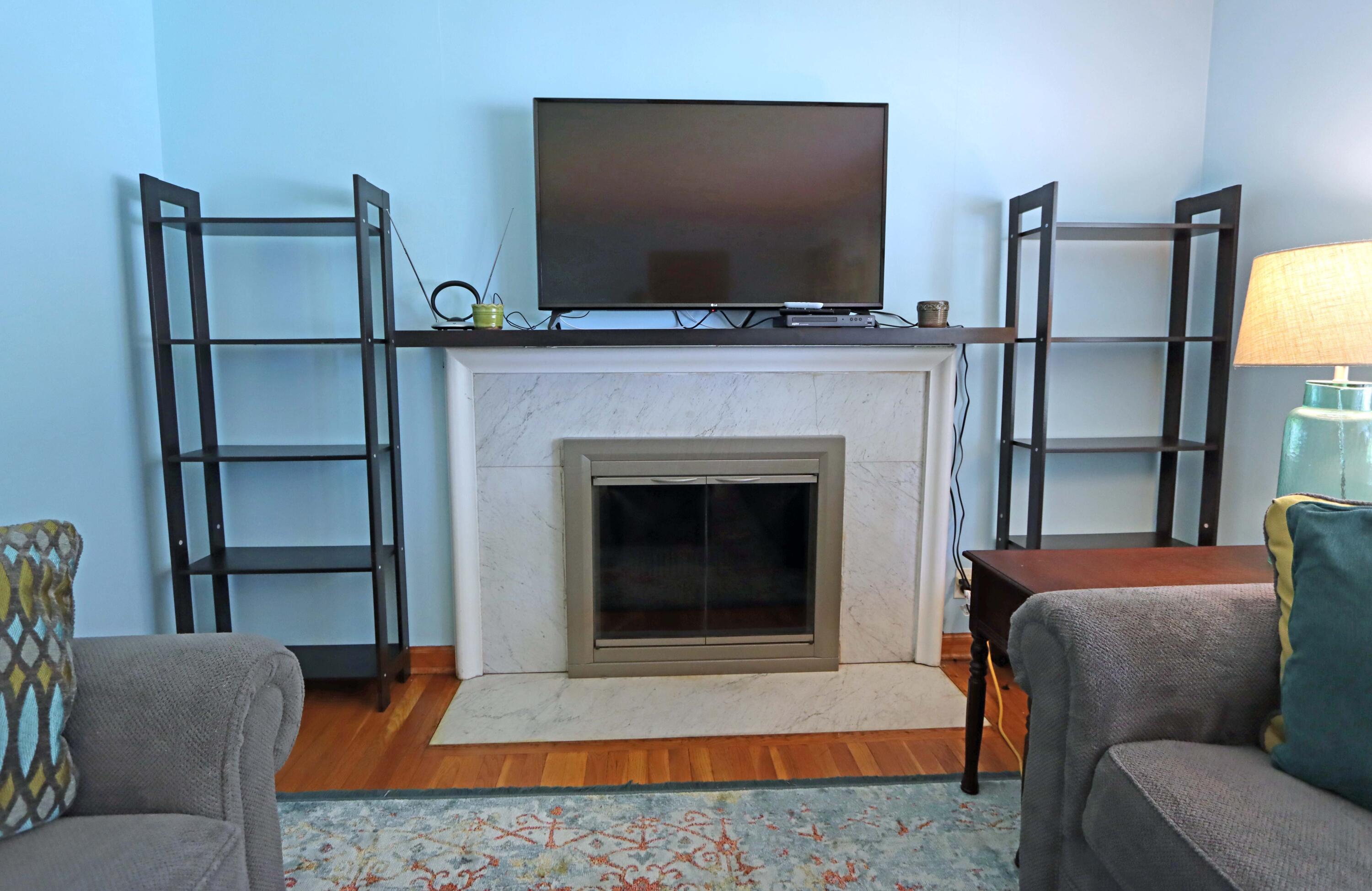 2717 Tudor Road Columbus, OH 43209 - Photo 8 of 51 Fireplace with renovated surround