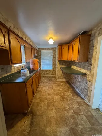 a lobby with furniture window and wooden floor