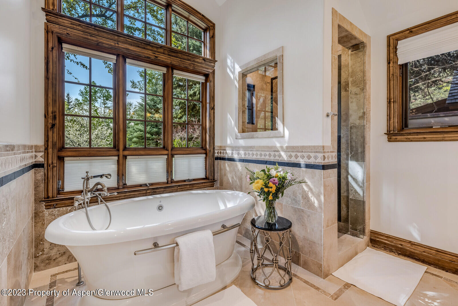 70 River Bend Road Snowmass, CO 81654 - Photo 29 of 70 a bathroom with a tub and sink
