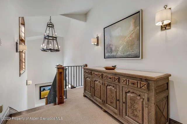 a utility room with sink dryer and washer