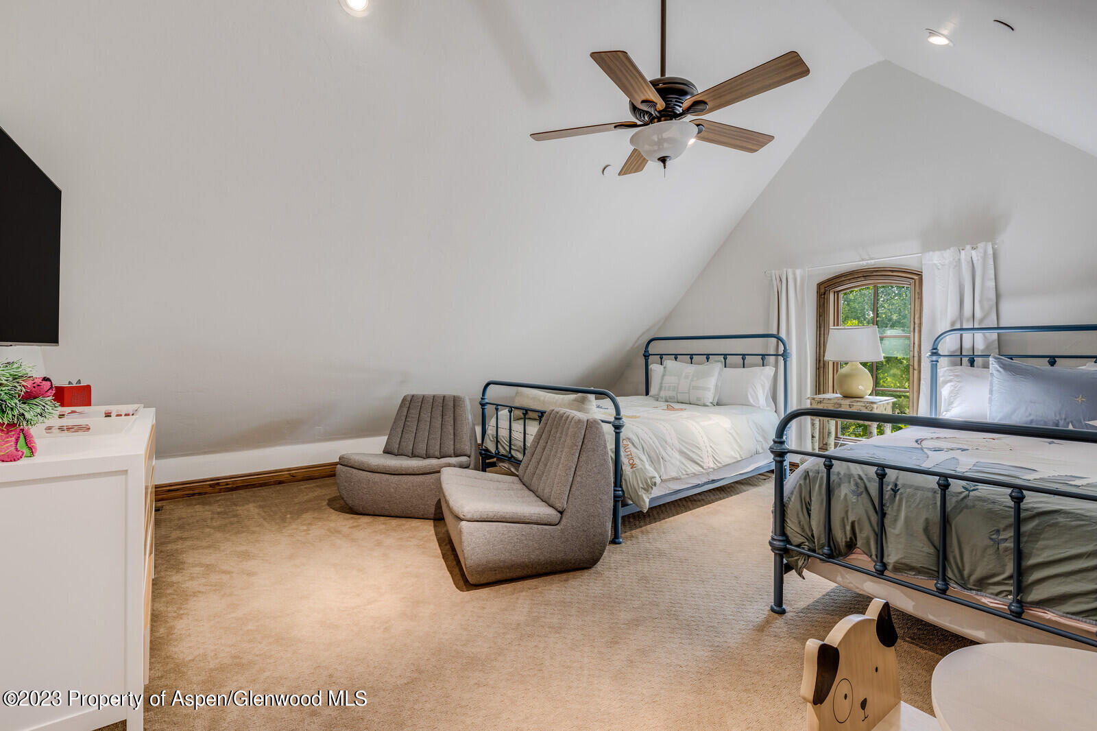 70 River Bend Road Snowmass, CO 81654 - Photo 40 of 70 a bedroom with furniture and a chandelier fan