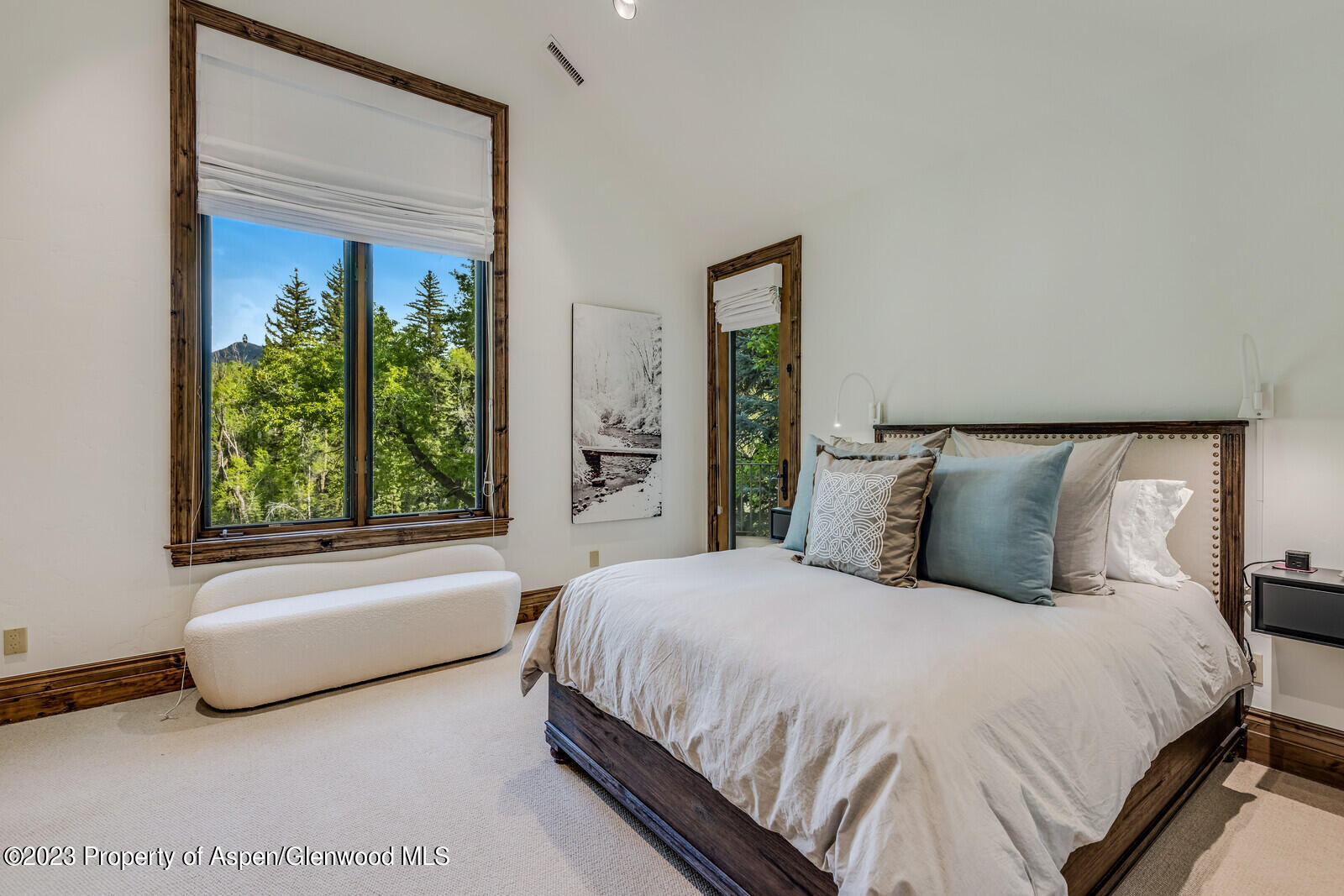 70 River Bend Road Snowmass, CO 81654 - Photo 42 of 70 a bedroom with a bed and a large window