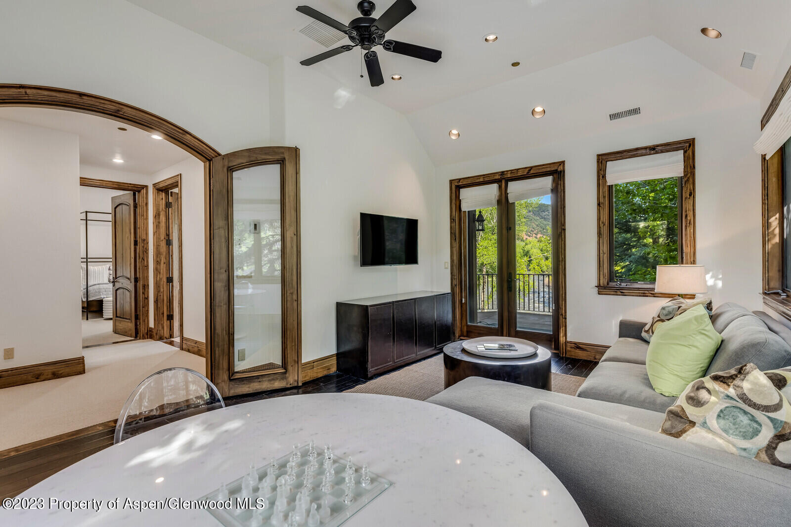 70 River Bend Road Snowmass, CO 81654 - Photo 50 of 70 a living room with furniture ceiling fan and a window