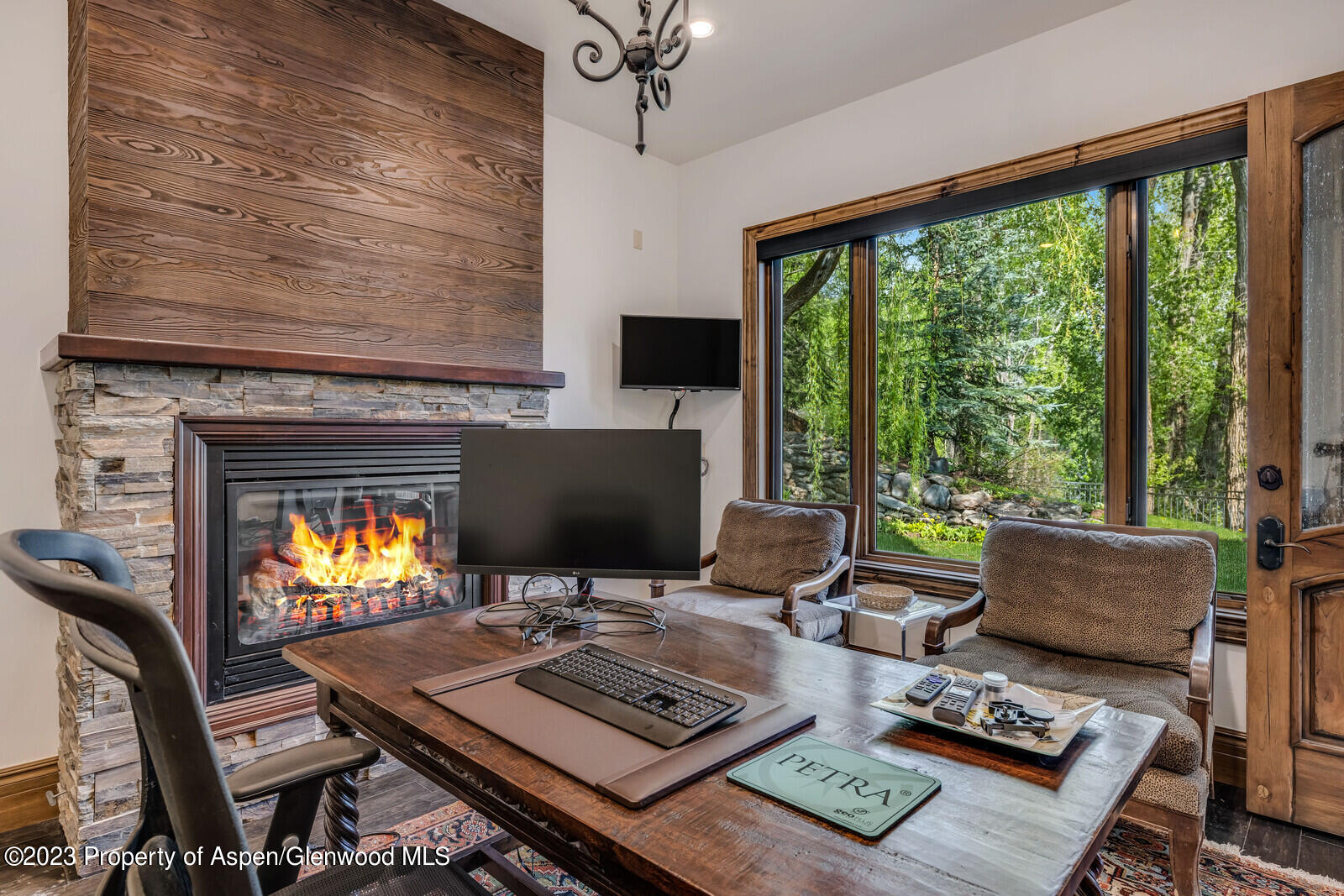 70 River Bend Road Snowmass, CO 81654 - Photo 51 of 70 a living room with furniture and a flat screen tv