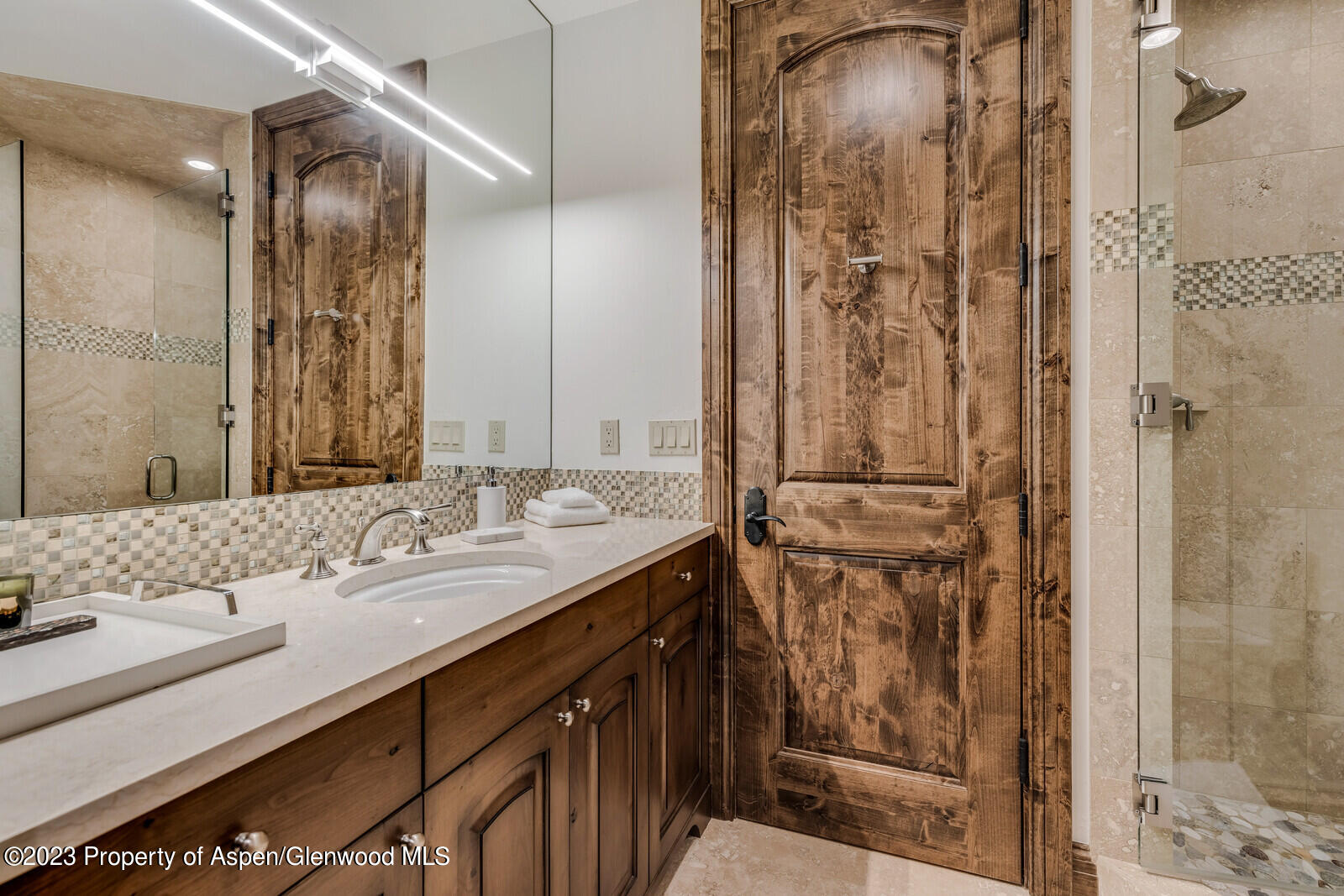 70 River Bend Road Snowmass, CO 81654 - Photo 59 of 70 a bathroom with a sink and a mirror