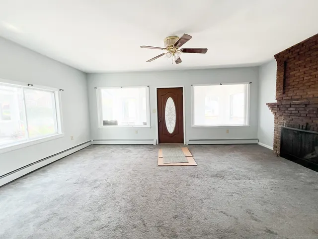 an empty room with windows