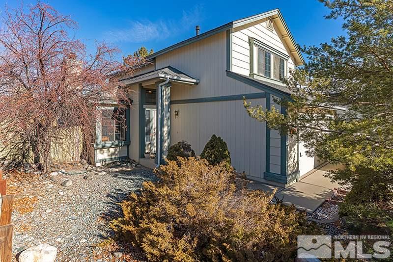 5849 Walnut Creek Road Reno, NV 89523 - Photo 14 of 20 front view of a house with a yard