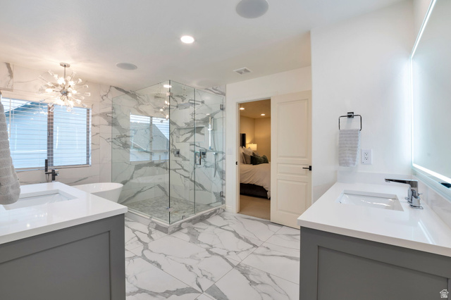 577 South Ridge Top Lane East North Salt Lake, UT 84054 - Photo 14 of 57 Beautifully renovated spa bath featuring a freestanding soaking tub, oversized walk-in shower, and designer finishes throughout.