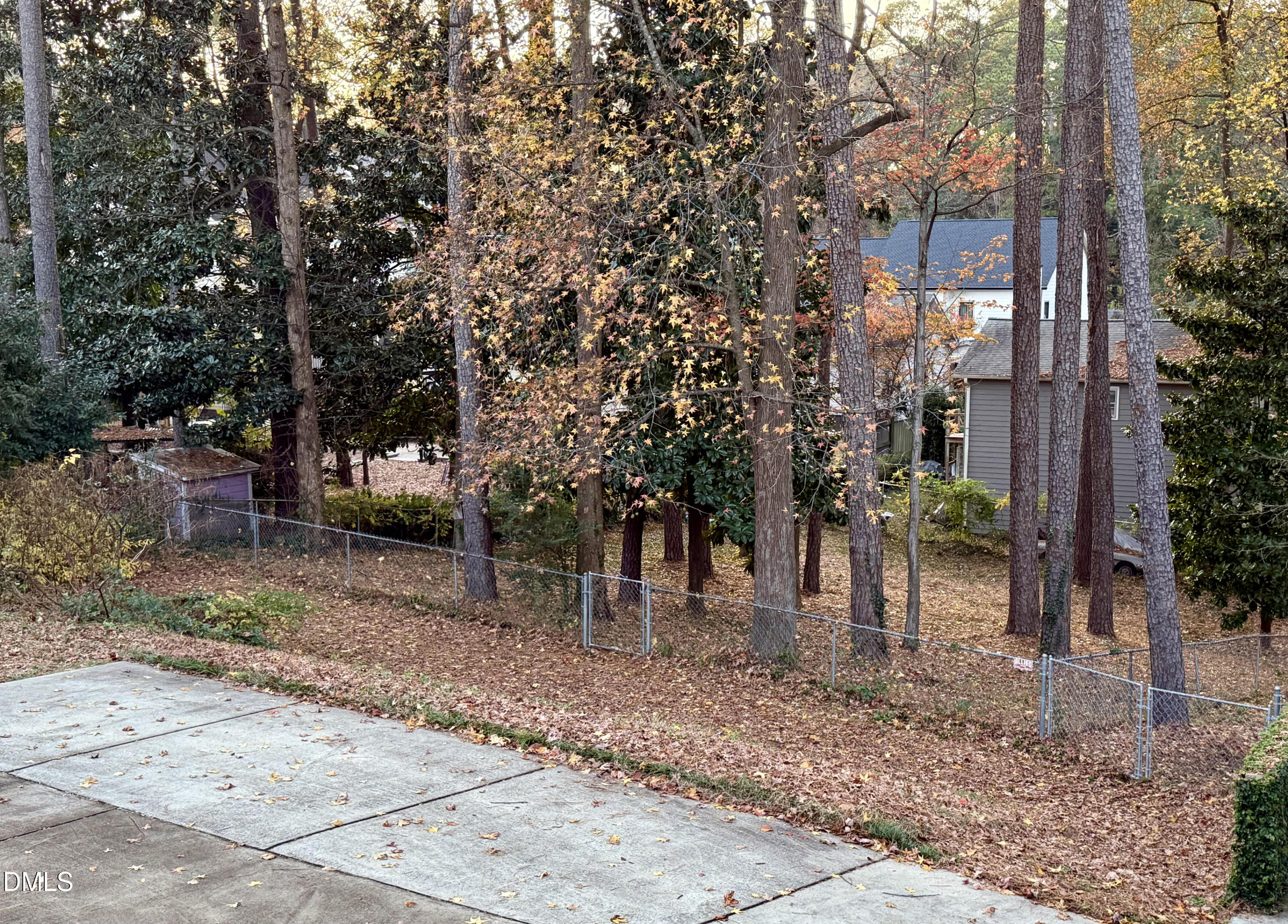 1313 Ridge Road Raleigh, NC 27607 - Photo 33 of 36 a view of a trees in front of a house