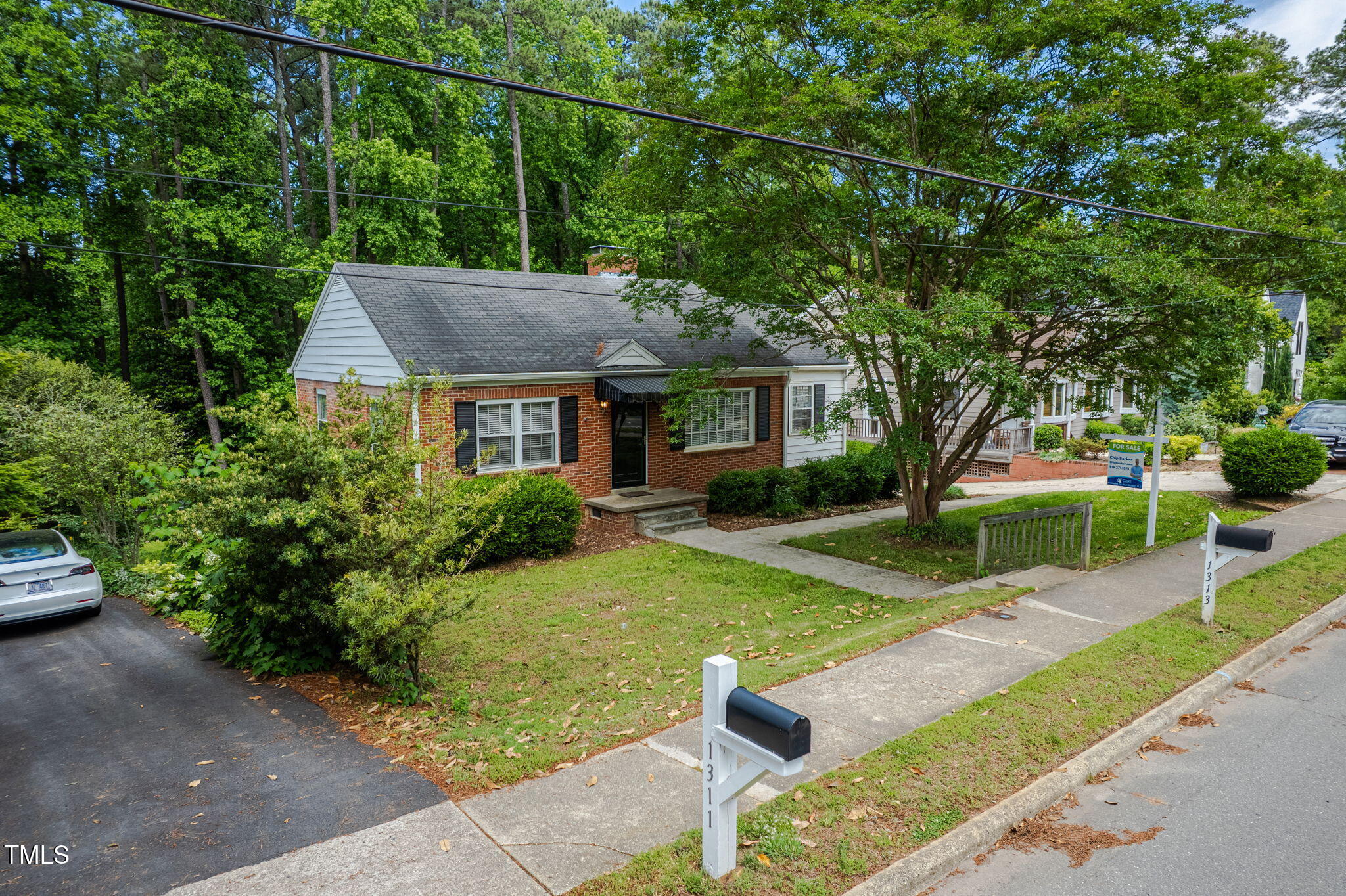 1313 Ridge Road Raleigh, NC 27607 - Photo 35 of 36 a front view of a house with garden