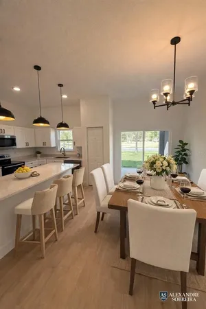 a living room with furniture and a table