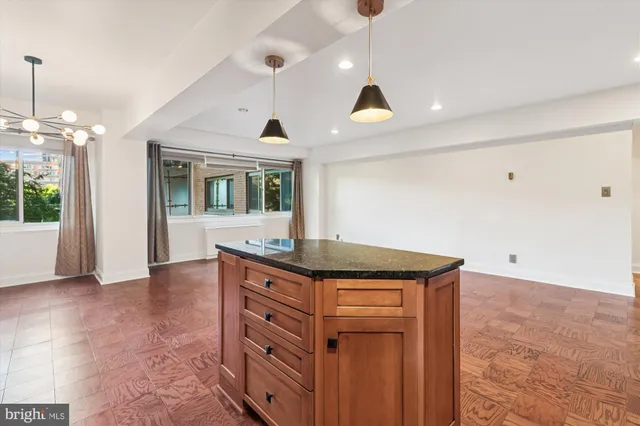 a view of room with window and hardwood floor