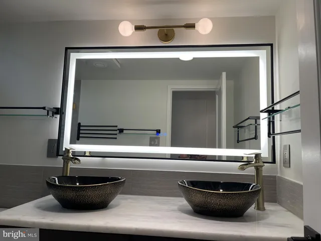 a kitchen with a sink and a stove